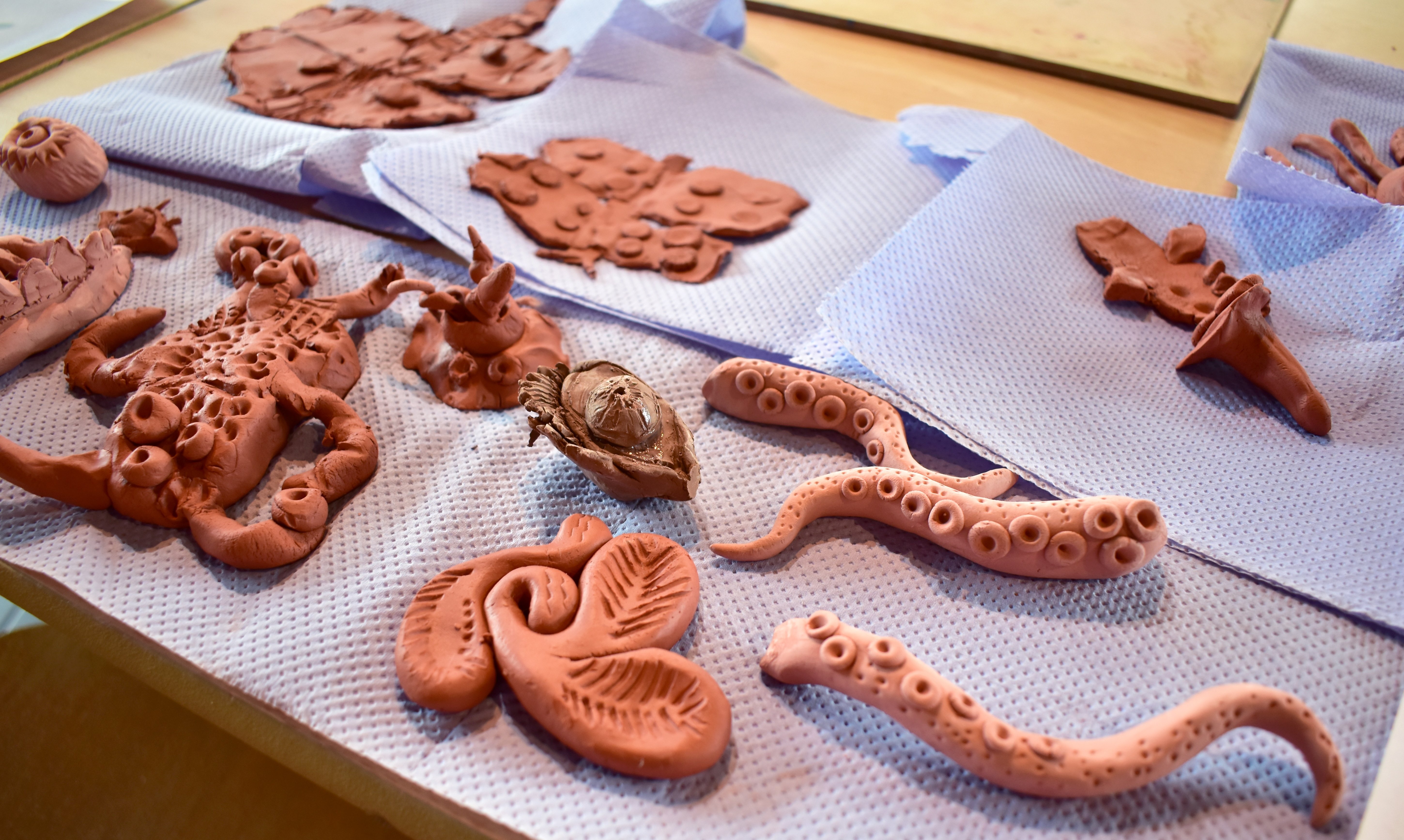 Clay creatures inspired by Non's exhibition