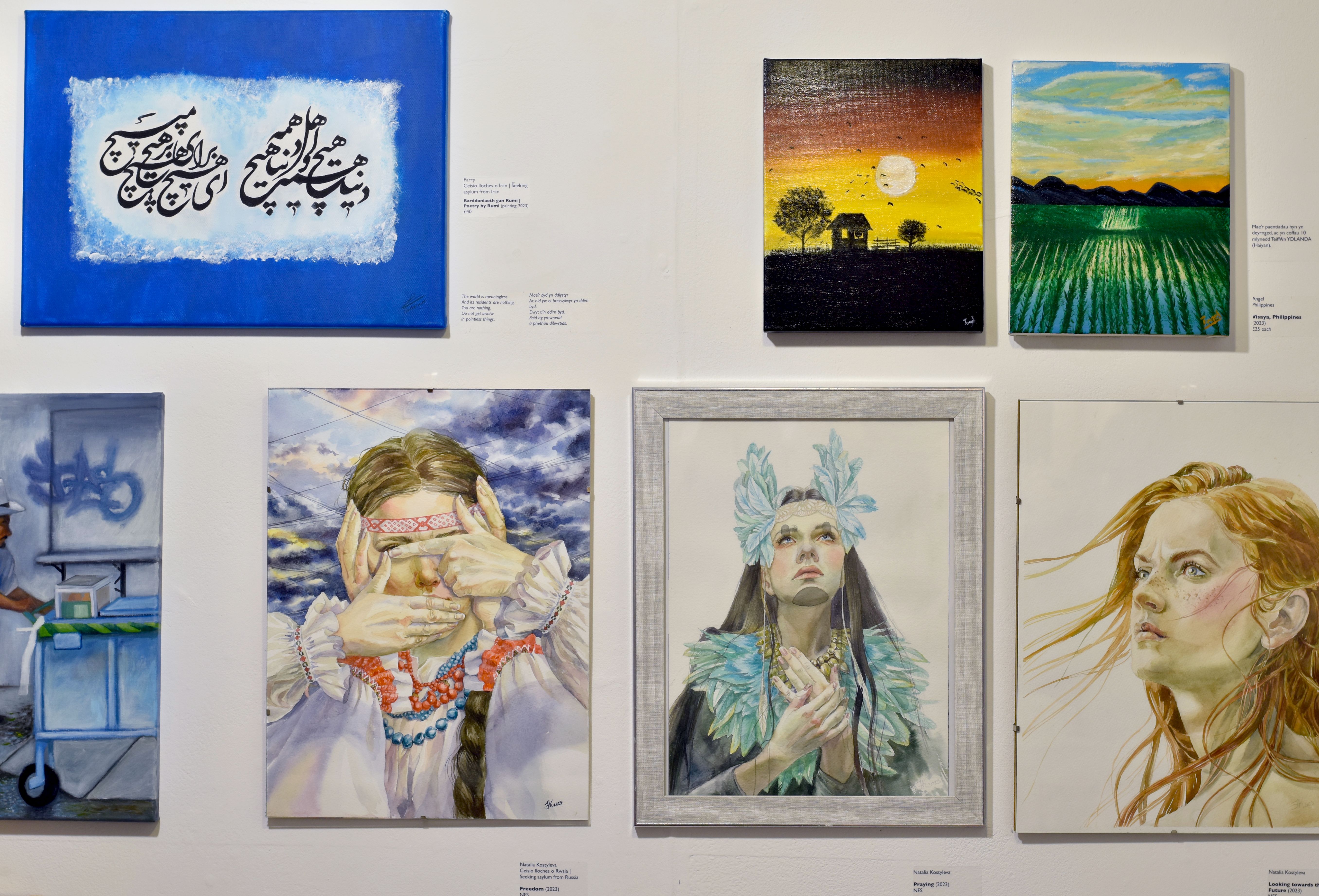Install images of artworks by local artists seeking asylum in Swansea