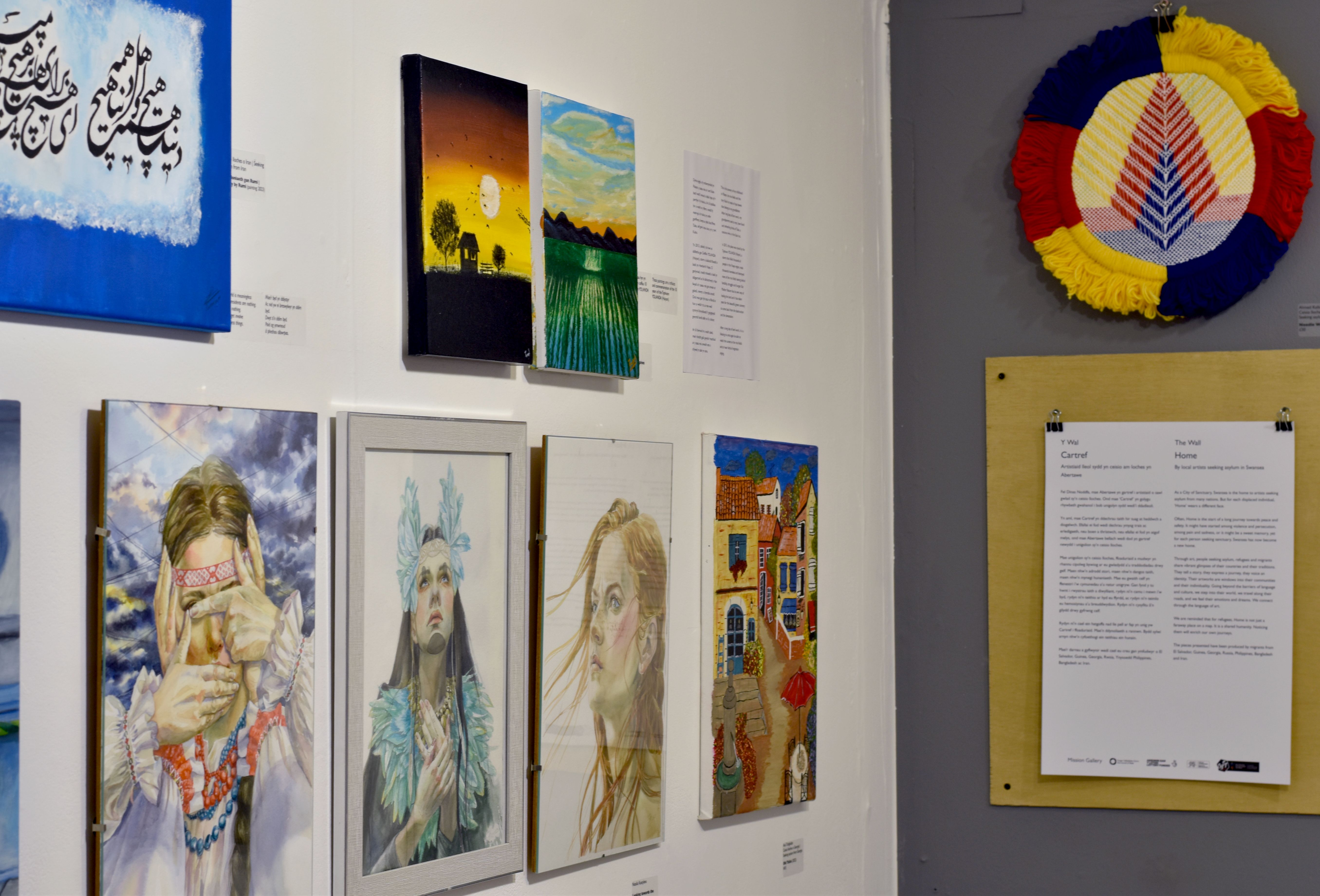 Install images of artworks by local artists seeking asylum in Swansea